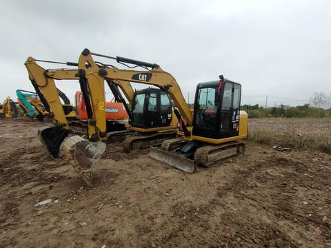 2024 Caterpillar 303.5 mini excavator, front three-quarter view 2024 Caterpillar 303.5 mini excavator, front three-quarter view