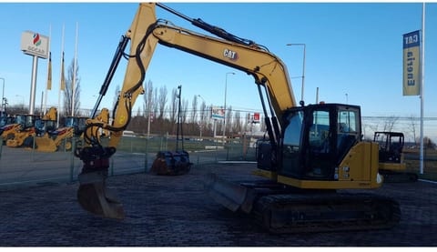 2021 Caterpillar 310-07 crawler excavator side view 2021 Caterpillar 310-07 crawler excavator side view
