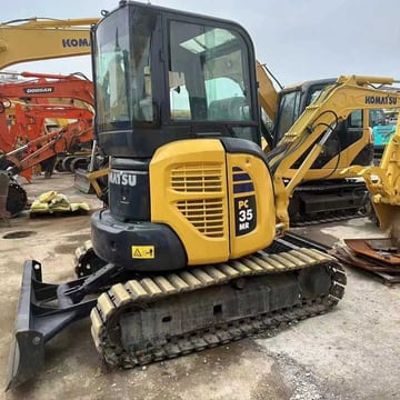 2011 Komatsu PC35MR mini excavator, front three-quarter view 2011 Komatsu PC35MR mini excavator, front three-quarter view