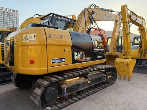 2019 Caterpillar 312D2GC crawler excavator, rear three-quarter view 2019 Caterpillar 312D2GC crawler excavator, rear three-quarter view