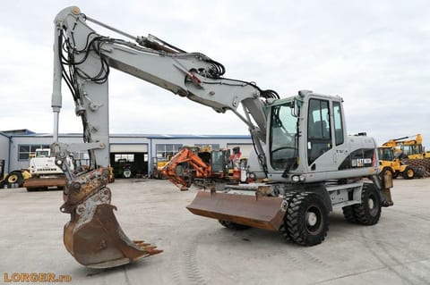 2009 Caterpillar M313D wheel excavator side view 2009 Caterpillar M313D wheel excavator side view
