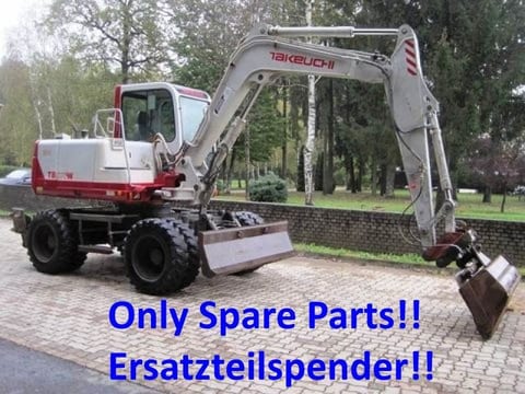 2000 Takeuchi TB070W wheel excavator side view 2000 Takeuchi TB070W wheel excavator side view