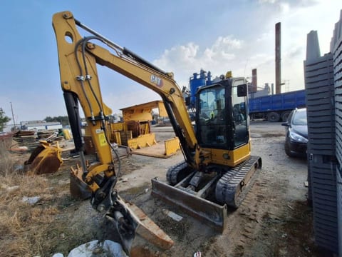 2022 Caterpillar 304 crawler excavator, front three-quarter view 2022 Caterpillar 304 crawler excavator, front three-quarter view