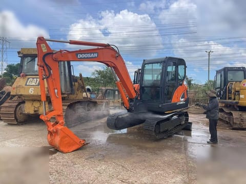 2021 Doosan DX60-9C crawler excavator, side view 2021 Doosan DX60-9C crawler excavator, side view