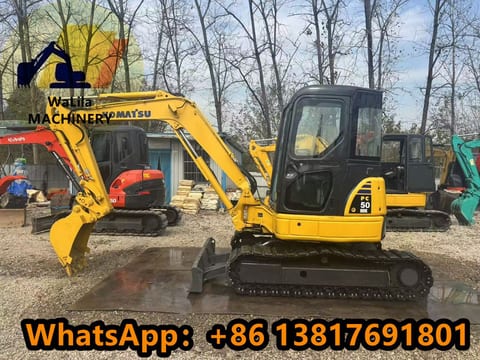 2023 Komatsu PC50MR mini excavator side view 2023 Komatsu PC50MR mini excavator side view