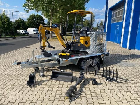 Berger Kraus BK1000JS mini excavator on trailer, side view Berger Kraus BK1000JS mini excavator on trailer, side view