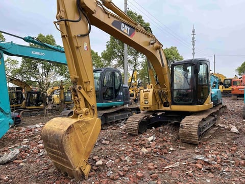 2022 Caterpillar 313C mini excavator, front three-quarter view 2022 Caterpillar 313C mini excavator, front three-quarter view