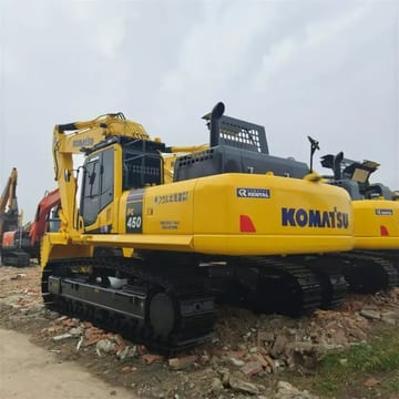 Komatsu PC450 crawler excavator, rear three-quarter view Komatsu PC450 crawler excavator, rear three-quarter view