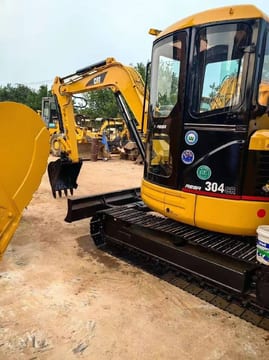 2024 Caterpillar 304 CR mini excavator, side view 2024 Caterpillar 304 CR mini excavator, side view