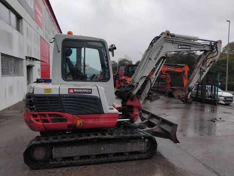 2016 Takeuchi TB250 mini excavator side view 2016 Takeuchi TB250 mini excavator side view
