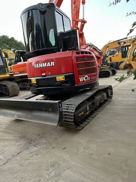 2015 Yanmar ViO55 mini excavator, rear three-quarter view 2015 Yanmar ViO55 mini excavator, rear three-quarter view