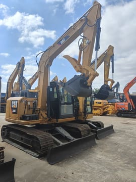 Caterpillar 308E crawler excavator, front three-quarter view Caterpillar 308E crawler excavator, front three-quarter view