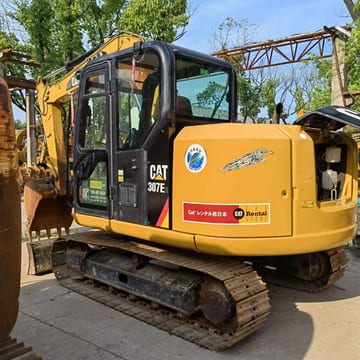 2022 Caterpillar 307E2 excavator, rear three-quarter view 2022 Caterpillar 307E2 excavator, rear three-quarter view