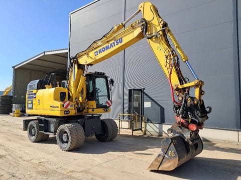 2023 Komatsu PW180-11E0 wheel excavator, side view 2023 Komatsu PW180-11E0 wheel excavator, side view