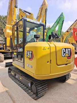 2024 Caterpillar 305.5E2 mini excavator, rear three-quarter view 2024 Caterpillar 305.5E2 mini excavator, rear three-quarter view