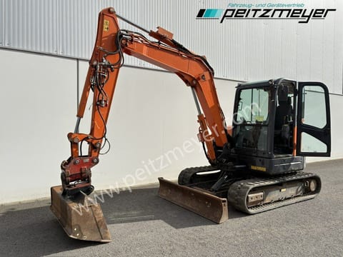 2018 Doosan DX63-3 mini excavator, side view 2018 Doosan DX63-3 mini excavator, side view