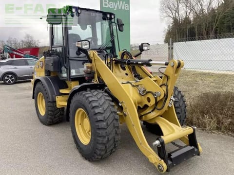 2023 Caterpillar 908 wheel loader, front three-quarter view 2023 Caterpillar 908 wheel loader, front three-quarter view