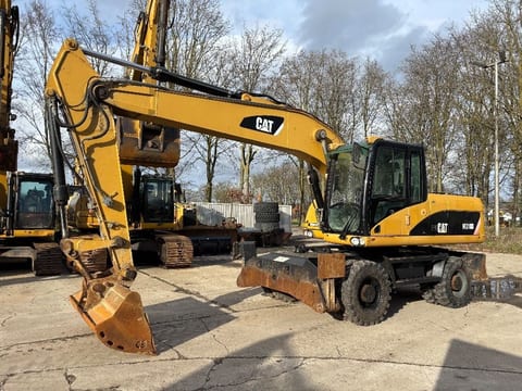 2008 Caterpillar M318D wheel excavator, side view 2008 Caterpillar M318D wheel excavator, side view