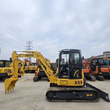 2023 Komatsu PC-55MR mini excavator, side profile view 2023 Komatsu PC-55MR mini excavator, side profile view