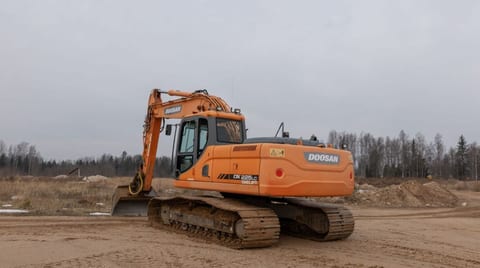 Doosan DX225LC crawler excavator, rear three-quarter view Doosan DX225LC crawler excavator, rear three-quarter view