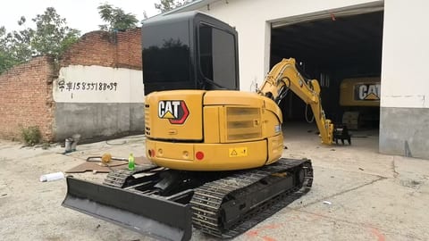 2022 Caterpillar 303.5E mini excavator rear three-quarter view 2022 Caterpillar 303.5E mini excavator rear three-quarter view