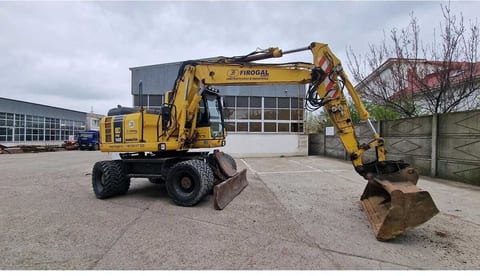 Komatsu PW148-8 wheel excavator, side profile view Komatsu PW148-8 wheel excavator, side profile view