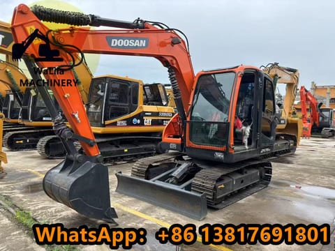 2023 Doosan DX75-9 mini excavator, front three-quarter view 2023 Doosan DX75-9 mini excavator, front three-quarter view