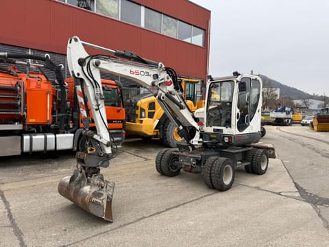 2013 Wacker Neuson 6503-2 wheel excavator, side view 2013 Wacker Neuson 6503-2 wheel excavator, side view