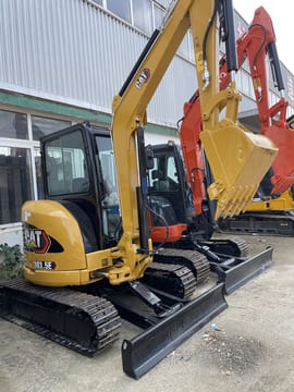 2024 Caterpillar 303.5E mini excavator, rear three-quarter view 2024 Caterpillar 303.5E mini excavator, rear three-quarter view