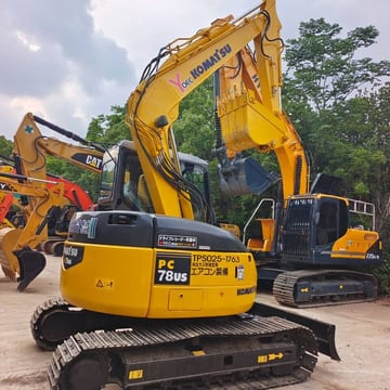 2024 Komatsu PC78US mini excavator, rear three-quarter view 2024 Komatsu PC78US mini excavator, rear three-quarter view