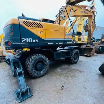 2018 Hyundai 210W-9 wheeled excavator, rear three-quarter view 2018 Hyundai 210W-9 wheeled excavator, rear three-quarter view