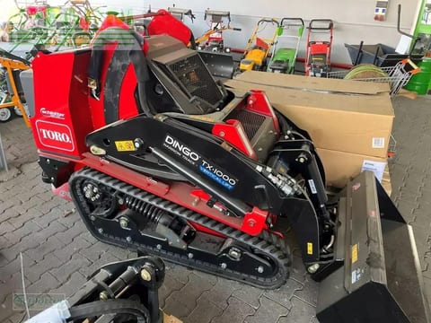 2022 Toro DINGO TX1000 mini excavator, side view 2022 Toro DINGO TX1000 mini excavator, side view