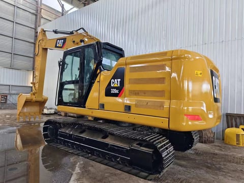 2023 Caterpillar 320GC crawler excavator, rear three-quarter view 2023 Caterpillar 320GC crawler excavator, rear three-quarter view