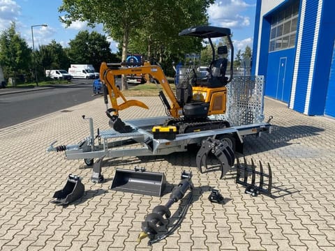 Berger Kraus BK1300JSR mini excavator on trailer with attachments Berger Kraus BK1300JSR mini excavator on trailer with attachments