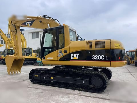 2012 Caterpillar 320CL paletli ekskavatör, yandan profil görünümü 2012 Caterpillar 320CL paletli ekskavatör, yandan profil görünümü