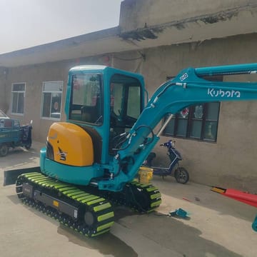 2023 Kubota U25 mini excavator, side view 2023 Kubota U25 mini excavator, side view