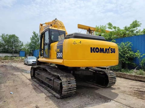 2018 Komatsu PC300-7 crawler excavator, rear three-quarter view 2018 Komatsu PC300-7 crawler excavator, rear three-quarter view