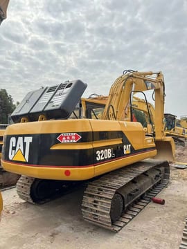 2015 Caterpillar 320BL crawler excavator, rear three-quarter view 2015 Caterpillar 320BL crawler excavator, rear three-quarter view