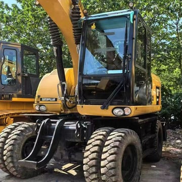 2019 Caterpillar M315D2 wheel excavator, front three-quarter view 2019 Caterpillar M315D2 wheel excavator, front three-quarter view