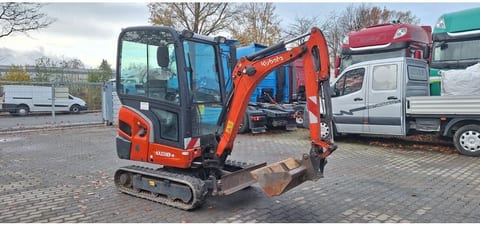 2014 Kubota KX018-4 mini excavator, front three-quarter view 2014 Kubota KX018-4 mini excavator, front three-quarter view