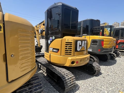 2024 Caterpillar 304CR mini excavator, rear three-quarter view 2024 Caterpillar 304CR mini excavator, rear three-quarter view