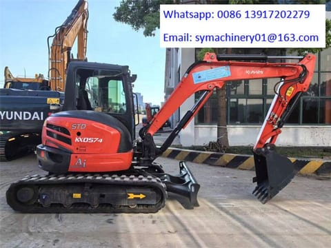 2023 Kubota KX057-4 mini excavator, side view 2023 Kubota KX057-4 mini excavator, side view
