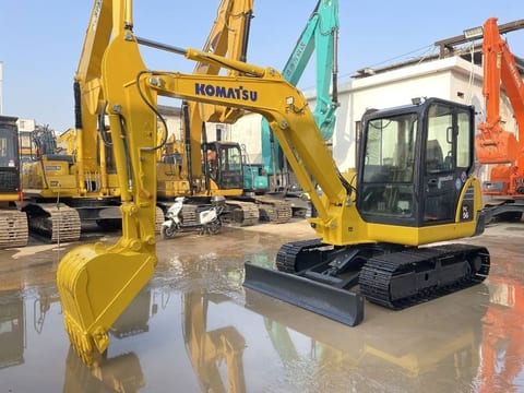 2022 Komatsu PC56-7 mini excavator, front three-quarter view 2022 Komatsu PC56-7 mini excavator, front three-quarter view