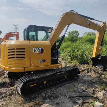 2020 Caterpillar 307E mini excavator, rear three-quarter view