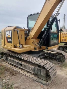 2023 Caterpillar 307E2 mini excavator rear three-quarter view 2023 Caterpillar 307E2 mini excavator rear three-quarter view