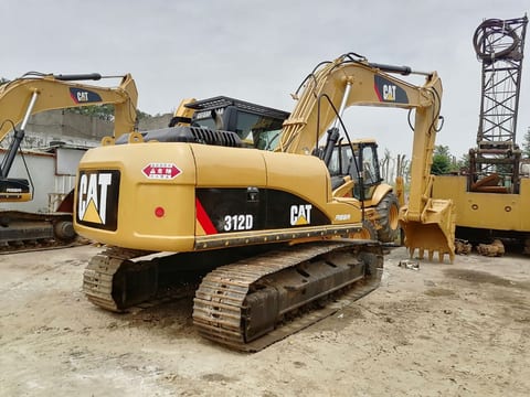 2022 Caterpillar 312D excavator, rear three-quarter view