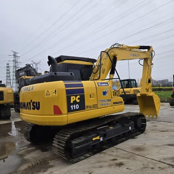 2023 Komatsu PC110 crawler excavator, rear three-quarter view 2023 Komatsu PC110 crawler excavator, rear three-quarter view