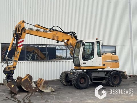 2004 Liebherr A312 Litronic wheel excavator side view 2004 Liebherr A312 Litronic wheel excavator side view