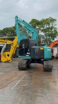 2015 Kobelco SK135SR crawler excavator, rear three-quarter view 2015 Kobelco SK135SR crawler excavator, rear three-quarter view