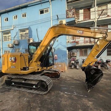2018 Caterpillar 307E2 mini excavator side view 2018 Caterpillar 307E2 mini excavator side view
